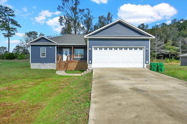 ranch-style house featuring a front yard and a garage