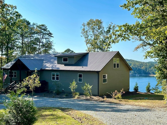 exterior space with a water view