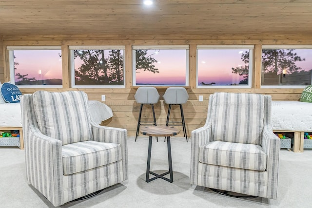 sunroom / solarium featuring wood ceiling