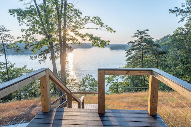 deck at dusk with a water view