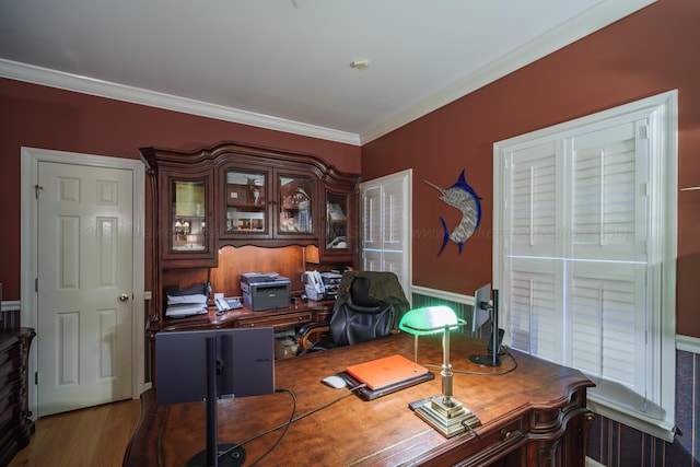 office area featuring light hardwood / wood-style flooring and ornamental molding