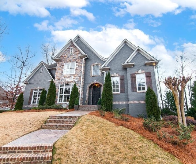 view of front of home with a front lawn