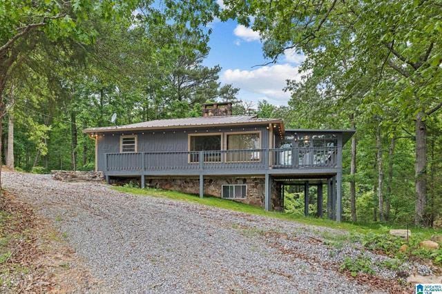 view of front of house with a deck