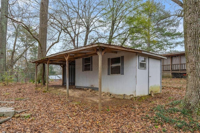 view of outbuilding with an outbuilding and a carport