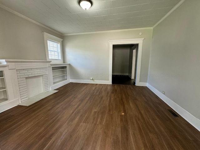 unfurnished living room featuring crown molding and dark wood-type flooring