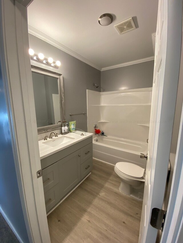 corridor with carpet floors and crown molding