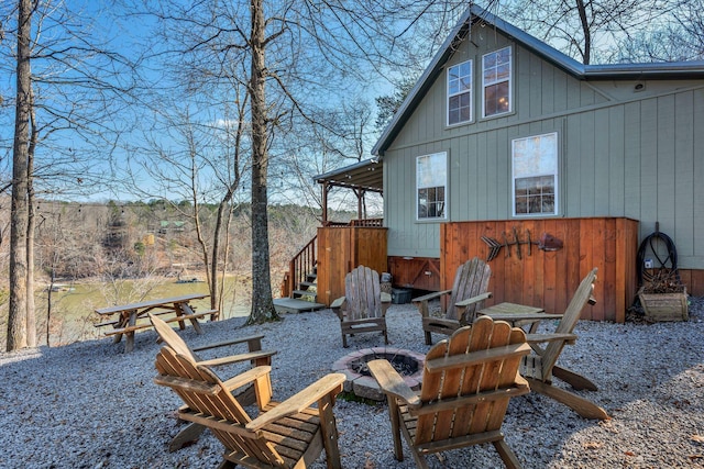 view of patio with a fire pit