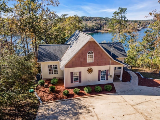 view of front facade with a water view