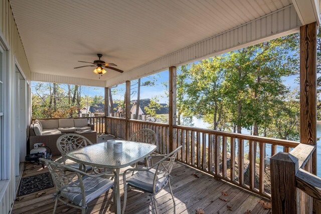 sunroom featuring a wealth of natural light and ceiling fan