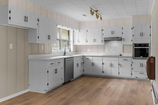 kitchen featuring white cabinetry, light hardwood / wood-style flooring, and appliances with stainless steel finishes