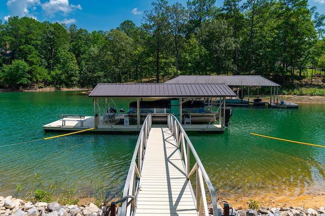 view of dock featuring a water view and boat lift