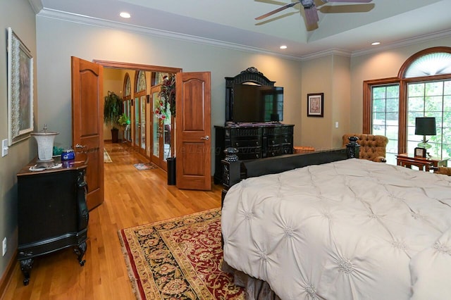 bedroom featuring recessed lighting, light wood finished floors, and ornamental molding