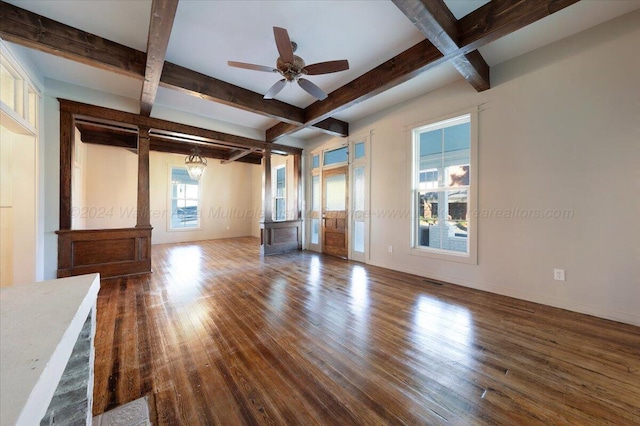 unfurnished living room with ceiling fan, beam ceiling, and wood-type flooring