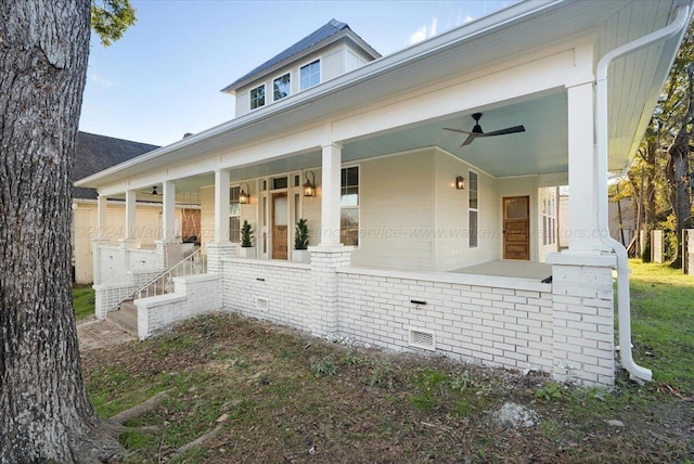 view of front of house featuring ceiling fan