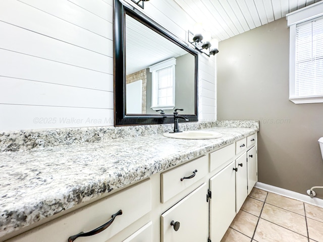 bathroom featuring vanity and tile patterned flooring