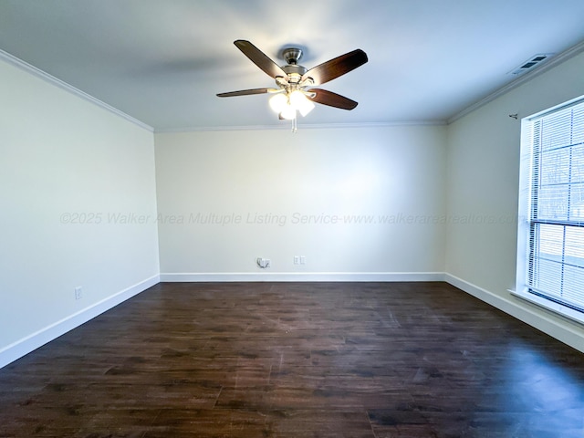 unfurnished room with dark hardwood / wood-style flooring, ornamental molding, and ceiling fan