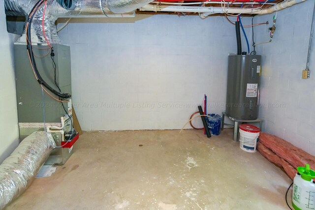 basement featuring electric water heater