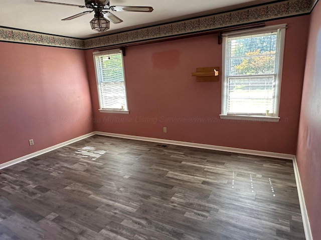 unfurnished room with wood-type flooring and ceiling fan