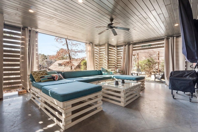 view of patio / terrace with an outdoor living space, ceiling fan, and area for grilling