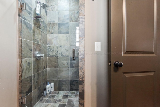 bathroom with an enclosed shower