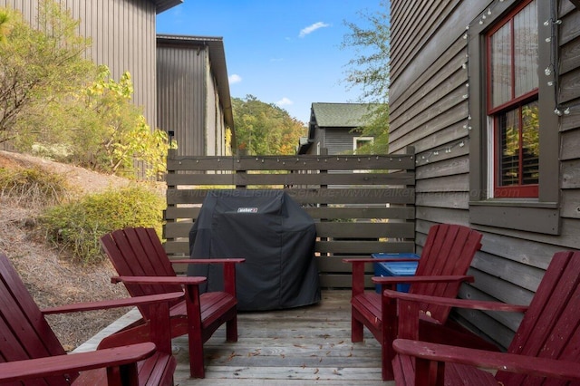 wooden terrace with grilling area