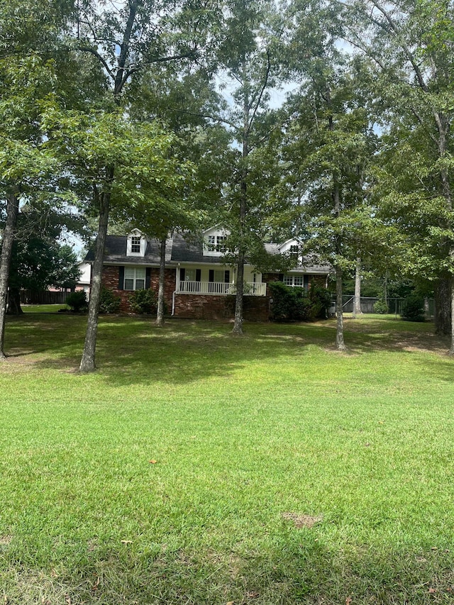 view of yard with covered porch