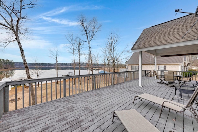 wooden terrace with a water view