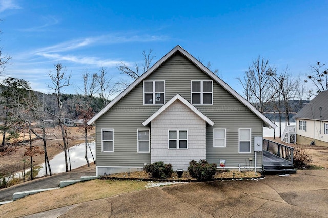 rear view of property with a deck