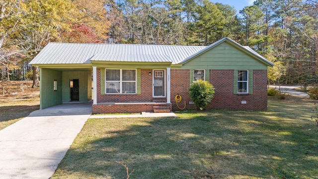 single story home with a front lawn and a carport