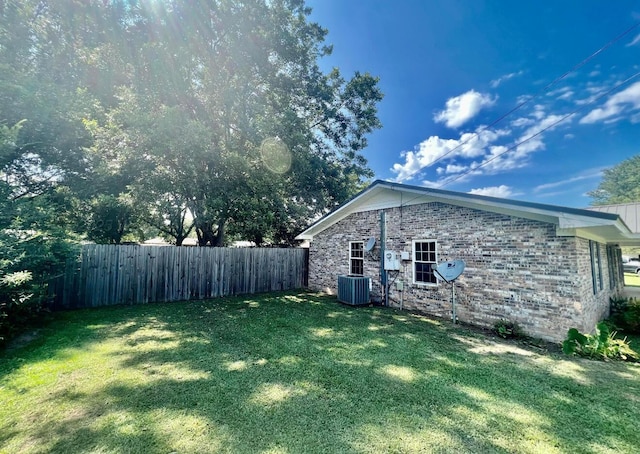 view of yard featuring central AC