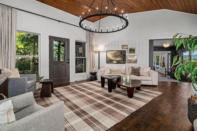 living room featuring hardwood / wood-style floors, wood ceiling, high vaulted ceiling, and a chandelier