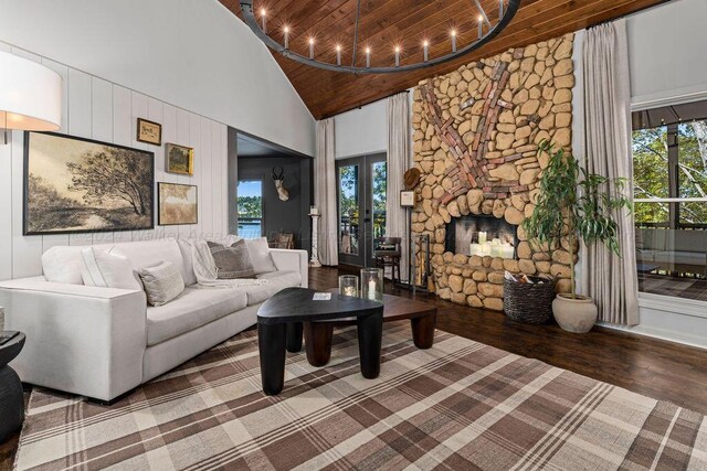 living room featuring a wealth of natural light, a fireplace, high vaulted ceiling, and wooden ceiling