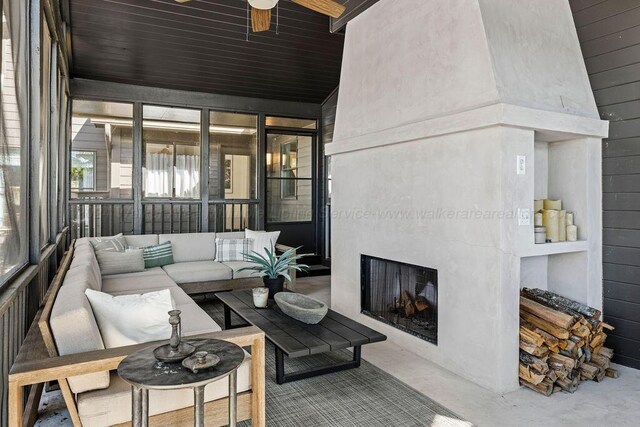 exterior space featuring a high end fireplace, lofted ceiling, and wood ceiling