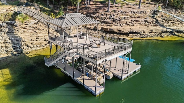 dock area featuring a water view