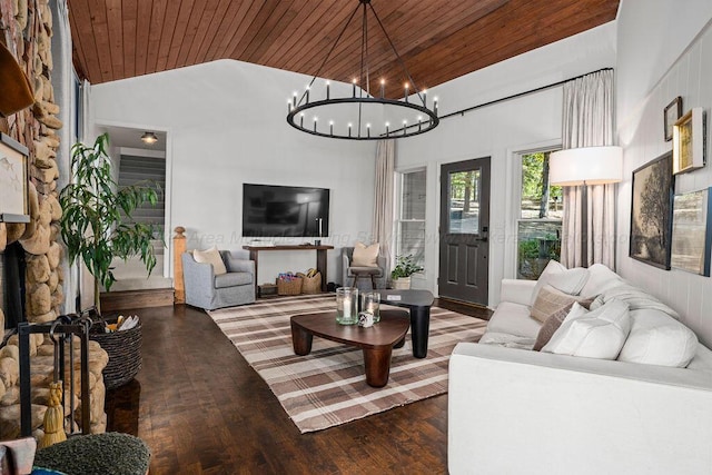 living room with wooden ceiling, high vaulted ceiling, a stone fireplace, a notable chandelier, and wood-type flooring