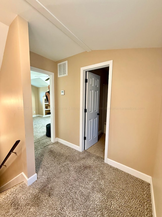 interior space with visible vents and baseboards