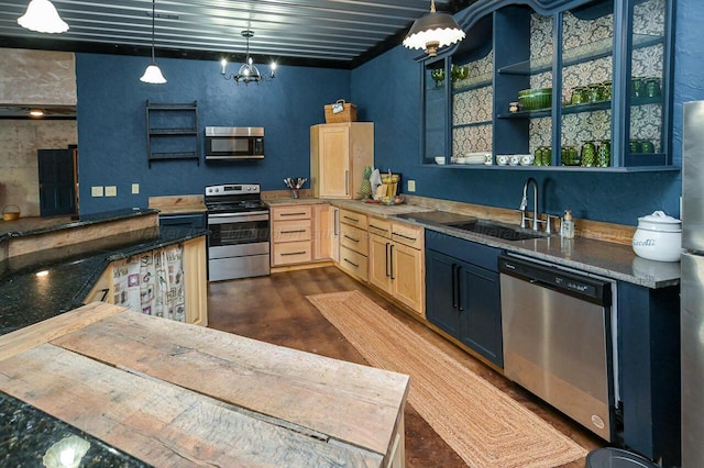 kitchen with sink, decorative light fixtures, light brown cabinetry, and stainless steel appliances