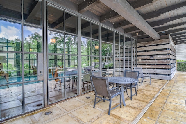 interior space with beamed ceiling