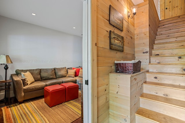 interior space featuring wooden walls