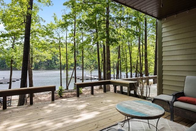 wooden terrace with a water view