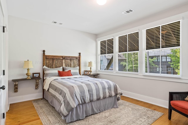 bedroom featuring light hardwood / wood-style floors