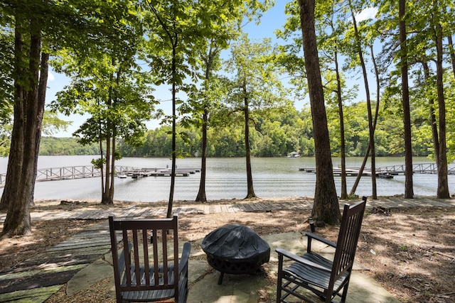 water view featuring an outdoor fire pit