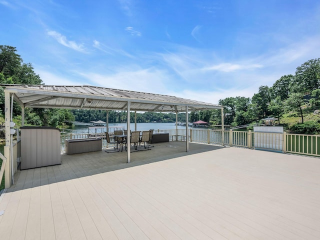 wooden terrace with a water view