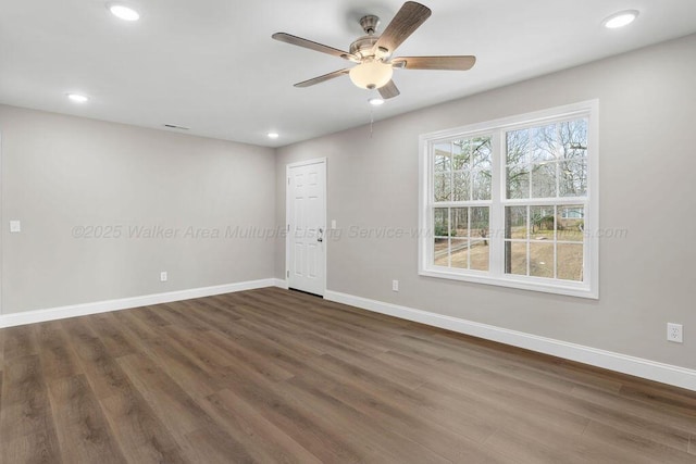 unfurnished room featuring baseboards, recessed lighting, a ceiling fan, and dark wood-type flooring