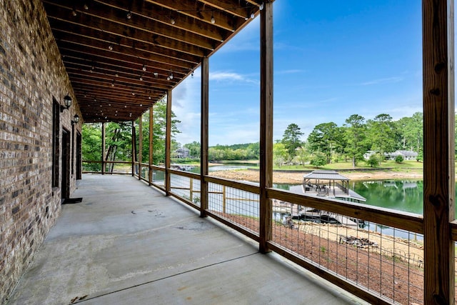 view of patio / terrace featuring a water view