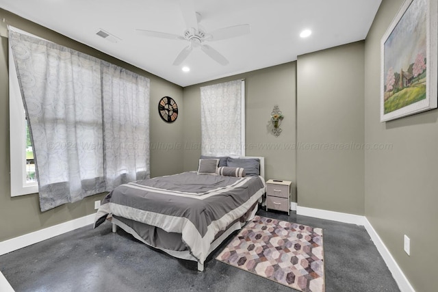 bedroom featuring concrete flooring and ceiling fan