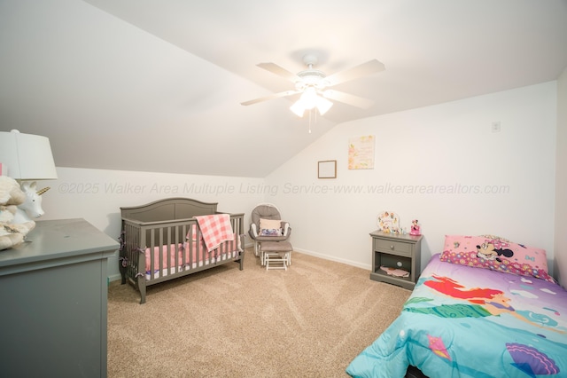 bedroom with baseboards, a ceiling fan, carpet flooring, and vaulted ceiling