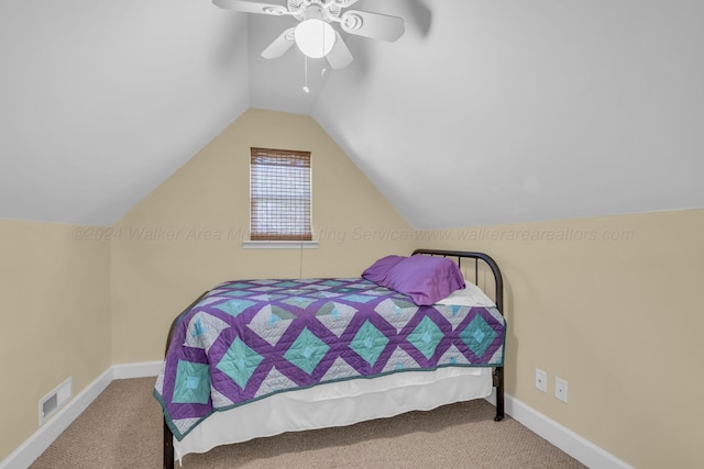 carpeted bedroom featuring ceiling fan and lofted ceiling