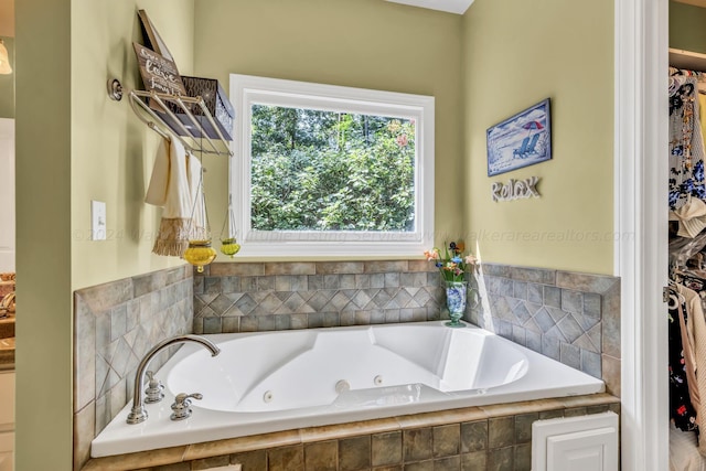 bathroom featuring tiled bath