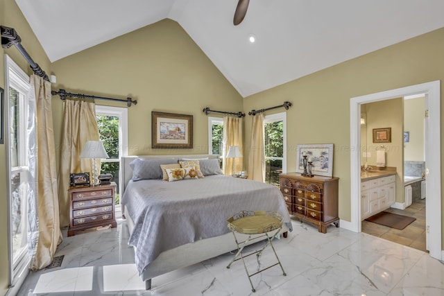 bedroom featuring connected bathroom, ceiling fan, and high vaulted ceiling